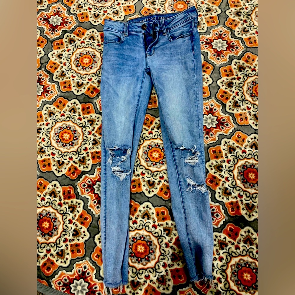 Light blue slightly ripped womens jeans